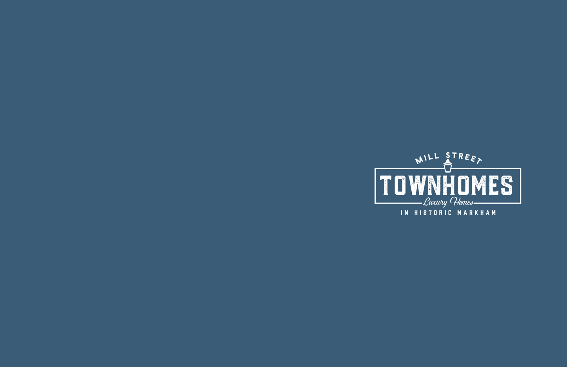 Mill Street Townhomes logo on blue background